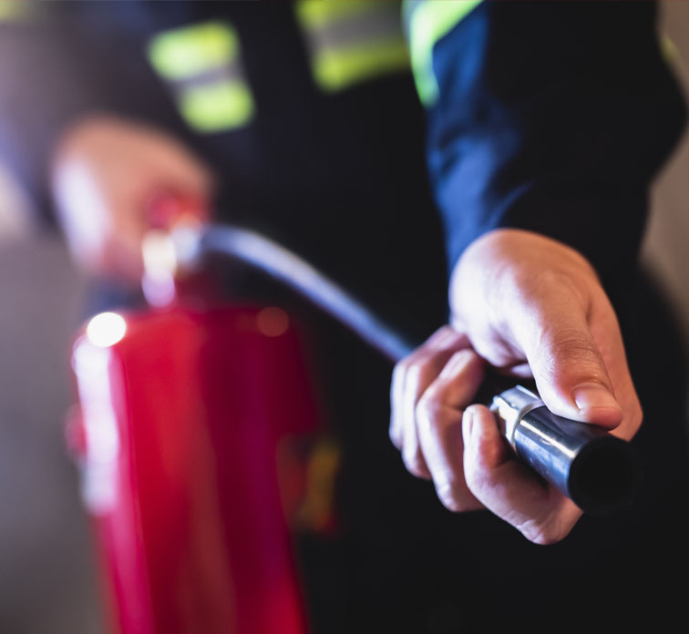 Logic Fire & Security using a fire extinguisher